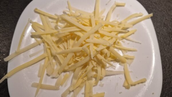 geriebener Käse für Ofenkartoffeln