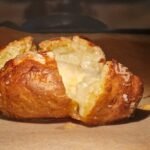 Ofenkartoffeln mit Käse Ofenkartoffeln mit geschmolzenem Käse